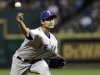 Texas Rangers' Yu Darvish delivers a pitch against the Houston Astros in the ninth inning of a baseball game Tuesday, April 2, 2013, in Houston. Darvish pitched eight and two-thirds perfect innings before giving up a hit to Astros' Marwin Gonzalez in the Rangers' 7-0 win. (AP Photo/Pat Sullivan)
