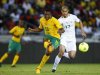 South Africa's Dkgacoi is challenged by Algeria's Guedioura during their international friendly soccer match in Soweto