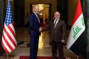A handout picture released by the Iraqi Prime Minister Haider al-Abadi's office on April 28, 2016 shows him (R) shaking hands with US Vice President Joe Biden following a meeting in Baghdad