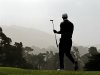Tiger Woods walks off the 17th green during the first round of the U.S. Open Championship golf tournament Thursday, June 14, 2012, at The Olympic Club in San Francisco. (AP Photo/Charlie Riedel)