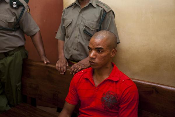 Kenya drops some charges against British terror suspect
