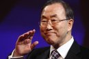 U.N. Secretary General Ban Ki-moon waves at the beginning of the fifth United Nations Alliance of Civilizations Forum in Vienna