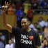 Former NBA basketball player Tracy McGrady of Detroit Pistons gestures to his fans at a stadium during a promotional event of his China tour in Hefei