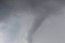 A tornado touches down southwest of Wichita, Kan. near the town of Viola on Sunday, May 19, 2013. The tornado was part of a line of storms that past through the central plains on Sunday. (AP Photo/The Wichita Eagle, Travis Heying)