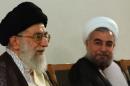 A handout picture released by the official website of the Iranian supreme leader Ayatollah Ali Khamenei (L) shows him meeting with President Hassan Rouhani (L) at his office in Tehran on June 16, 2013