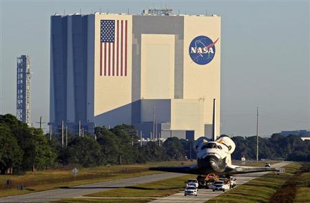 The space shuttle Atlantis leaves the Kennedy Space Center in Cape Canaveral, Florida November 2, 2012. REUTERS/Joe Skipper