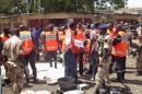 First responders gather at the site of a suicide bombing in N'djamena