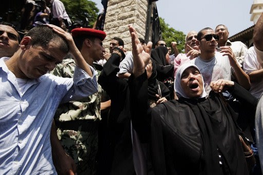 صور/ تغطية أخبارية /جنازة العسكريين المصريين 000-Nic6121981-jpg_062122