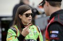 Nationwide Series driver Danica Patrick, left, talks with Ricky Stenhouse Jr., right, during qualifying for the OneMain Financial 200 NASCAR Nationwide Series auto race, Saturday, Sept. 29, 2012, in Dover, Del. (AP Photo/Nick Wass)