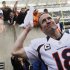 Denver Broncos quarterback Peyton Manning throws a towel into the stands after the Broncos defeated the Cincinnati Bengals 31-23 in an NFL football game, Sunday, Nov. 4, 2012, in Cincinnati. (AP Photo/Tom Uhlman)