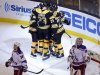 Bruins' players celebrate after scoring against Rangers in the third period of Game 2 of their NHL Eastern Conference semi-final hockey playoff series in Boston