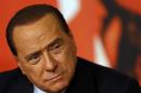 Italy's former PM Berlusconi attends a news conference in Rome