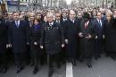 French President Francois Hollande (2-R) is surrounded by heads of state including Britain's PM David Cameron (L), Israel's PM Benjamin Netanyahu (4-R) and Germany's Chancellor Angela Merkel (R) at a solidarity march in Paris on January 11, 2015