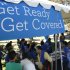 People gather for information during a Planned Parenthood Affordable Care Act outreach event for the Latino community in Los Angeles, California