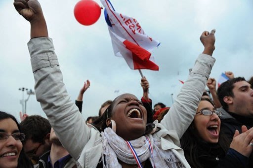 Supporters of the Socialist Party (PS) celebrate at the Place de la Bastille