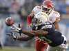 San Diego Chargers receiver Seyi Ajirotutu makes a diving catch in front of Kansas City Chiefs strong safety Eric Berry during the first half of an NFL football game Thursday, Nov. 1, 2012, in San Diego. (AP Photo/Greg Bull)