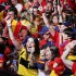 Spanish fans celebrate during the viewing of Euro 2012 soccer championship final match between Spain and Italy at the Fan Zone in Madrid, Spain, Sunday, July 1, 2012. (AP Photo/Andres Kudacki)
