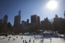 People skate on the Wollman Rink in Central Park in the Manhattan borough of New York