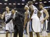 Memphis Grizzlies coach Lionel Hollins, second from left, restrains players Tayshaun Prince (21), Jerryd Bayless, Quincy Pondexter (20) and Marc Gasol, far right, after tempers flared during the first half of Game 6 in a first-round NBA basketball playoff series against the Los Angeles Clippers in Memphis, Tenn., Friday, May 3, 2013. The Grizzlies defeated the Clippers 118-105. (AP Photo/Danny Johnston)