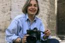 FILE - In this Thursday, April 2005 file photo, Associated Press photographer Anja Niedringhaus poses for a photograph in Rome. Niedringhaus, 48, was killed and an AP reporter was wounded on Friday, April 4, 2014 when an Afghan policeman opened fire while they were sitting in their car in eastern Afghanistan. Niedringhaus an internationally acclaimed German photographer, was killed instantly, according to an AP Television freelancer who witnessed the shooting. Kathy Gannon, the reporter, was wounded twice and is receiving medical attention. (AP Photo/Peter Dejong, File)