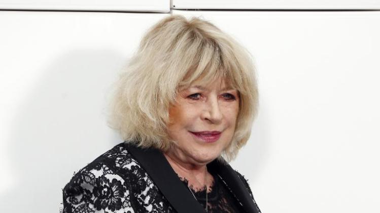 British composer and singer Marianne Faithfull poses upon arrival prior to attend Chanel 2014/2015 Autumn/Winter ready-to-wear collection fashion show, on March 4, 2014 at the Grand Palais in Paris