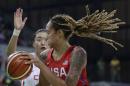 United States center Brittney Griner controls the ball under the basket during the first half of a women's basketball game against China at the Youth Center at the 2016 Summer Olympics in Rio de Janeiro, Brazil, Sunday, Aug. 14, 2016. (AP Photo/Carlos Osorio)