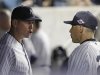 New York Yankees' Alex Rodriguez, left, talks to manager Joe Girardi during the 10th inning of Game 3 against the Baltimore Orioles in the American League division baseball series Wednesday, Oct. 10, 2012, in New York. The Yankees won 3-2. (AP Photo/Kathy Willens)