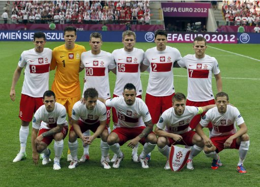 Poland's national soccer players line-up for a team photo before Euro 2012 soccer match in Warsaw