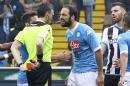 Napoli's Gonzalo Higuain argues with referee Massimiliano Irrati during a Serie A soccer match between Udinese and Napoli at the Friuli stadium, in Udine, Italy, Sunday, 3 April 2016. (Lancia/ANSA via AP)