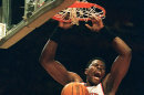 This Jan. 7, 1997 file photo shows New York Knicks center Patrick Ewing celebrating a slam-dunk in the first period of an NBA basketball game against the Dallas Mavericks in New York, On Tuesday March 6, 2012 Ewing was announced as part of the 10-member class that will be inducted into the National Collegiate Basketball Hall of Fame in November. The rest of the class includes Earl Monroe from Winston-Salem State and Willis Reed of Grambling. Kansas star Clyde Lovellette was selected along with North Carolina's Phil Ford and Wyoming's Kenny Sailors. Dave Robbins, who won more than 700 games at Virginia Union, and joins former Kentucky coach Joe B. Hall as the two coaches to be inducted. Businessmen Jim Host and Joe Dean will go in as contributors. (AP Photo/Ron Frehm, file)