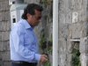 Francesco Schettino, the former captain of Costa Concordia, leaves his home in Meta Di Sorrento, near Naples, Sunday, Oct. 14, 2012. The first hearing of the trial for the Jan. 13 tragedy, where 32 people died after the luxury cruise Costa Concordia was forced to evacuate some 4,200 passengers as it hit a rock while passing too close to the Giglio Island, is taking place in Grosseto Monday. Captain Francesco Schettino, who was blamed for both the accident and for leaving the ship before the passengers, is scheduled to attend the hearing. (AP Photo/Salvatore Laporta)