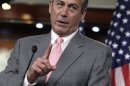 Speaker John Boehner gestures during a news conference in Washington