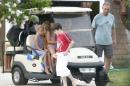 Robert F. Kennedy Jr., right, is seen with relatives at his home in Hyannis Port, Mass., Saturday, Aug. 2, 2014. Kennedy is to wed actress Cheryl Hines at the Kennedy Compound in Hyannis Port later in the day. (AP Photo/Stew Milne)