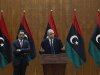 Libya's Prime Minister designate Abdurrahim El-Keib and Abdul Hafez Goga, spokesman for the NTC attend a news conference in Tripoli