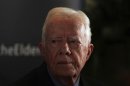 Former U.S. President Carter speaks during a news conference in Jerusalem