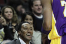 Scottie Pippen smiles as he talks to Los Angeles Lakers' Kobe Bryant before an NBA basketball game against the Chicago Bulls in Chicago, Friday, Dec. 10, 2010. (AP Photo/Nam Y. Huh)