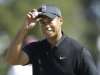 Tiger Woods reacts after making a birdie on the 10th hole during the second round of the U.S. Open Championship golf tournament Friday, June 15, 2012, at The Olympic Club in San Francisco. (AP Photo/Ben Margot)