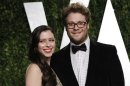 Actor Seth Rogen and wife Lauren Miller arrive at the 2012 Vanity Fair Oscar party in West Hollywood