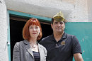 In this Tuesday, June 5, 2012 photo Brenda Smull public affairs officer for VFW Post 1 and post commander Izzy Abbass pose for their photo on the steps of the facility in Denver. The VFW's oldest chapter, Post 1, in Denver, is reorganizing itself around the needs of the new veterans. Its new building is currently being remodeled and won't have a full-time bar. (AP Photo/Ed Andrieski)