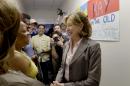 Sen. Kay Hagan, D-N.C., greets supporters during a visit to a campaign field office in Goldsboro, N.C., Monday, Aug. 25, 2014. (AP Photo/Gerry Broome)