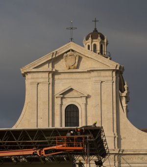 Workers give the last touches to the stage in front …