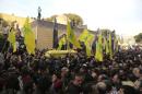 Lebanon's Hezbollah members and supporters carry the coffin of Jihad Moughniyah during his funeral in Beirut's suburbs
