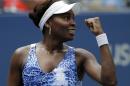 Venus Williams, of the United States, reacts to her coach's box after defeating Belinda Bencic, of Switzerland, during the third round of the U.S. Open tennis tournament, Friday, Sept. 4, 2015, in New York. (AP Photo/Matt Rourke)