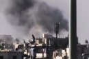 This image made from amateur video released by the Ugarit News and accessed Tuesday, July 31, 2012, purports to show black smoke rising from buildings in Aleppo, Syria. United Nations observers say fighter jets are firing on anti-government rebels in Aleppo. The airstrikes come after President Bashar Assad issued a rare statement today, urging his armed forces to step up the fight against the rebels. (AP Photo/Ugarit News via AP video) THE ASSOCIATED PRESS IS UNABLE TO INDEPENDENTLY VERIFY THE AUTHENTICITY, CONTENT, LOCATION OR DATE OF THIS HANDOUT PHOTO