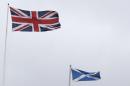 Union Jack and Saltire flags fly outside the Lloyds Banking Group Scottish Headquarters in Edinburgh, Scotland