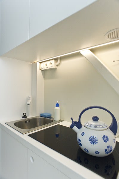 World's thinnest house Keret stovetop sink
