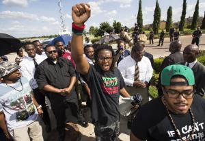 Malik Muhammad raises his fist during a demonstration &hellip;