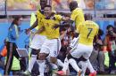 Colombia's Teofilo Gutierrez, centre, celebrates after scoring his side's second goal during the group C World Cup soccer match between Colombia and Greece at the Mineirao Stadium in Belo Horizonte, Brazil, Saturday, June 14, 2014. (AP Photo/Frank Augstein)