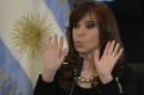 Argentine President Cristina Fernandez de Kirchner gestures during a signature meeting at the Government Palace in Buenos Aires on August 20, 2015