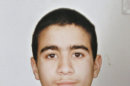 FILE - This undated photo shows Guantanamo detainee Omar Khadr, a Canadian, taken before he was imprisoned in 2002 at the age of 15. A decade after Khadr was pulled near death from the rubble of a bombed-out compound in Afghanistan, the Canadian citizen set foot on Canadian soil early Saturday, Sept. 29, 2012, after an American military flight from the notorious prison in Guantanamo Bay. (AP Photo/Canadian Press, File)